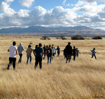 Students explore the grasslands of the Cienega watershed.